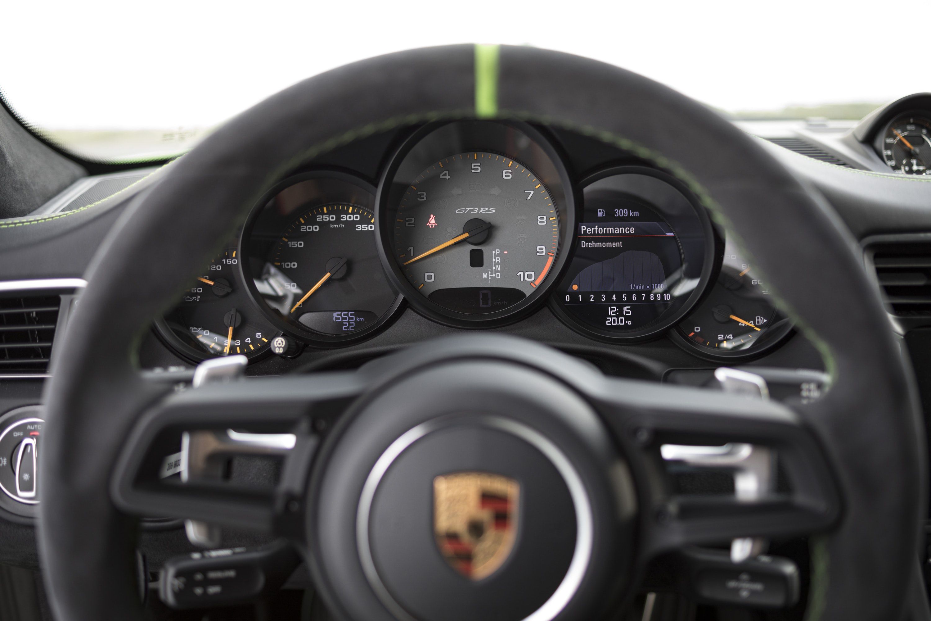 Close up of steering wheel and speedometer dials in the Porsche 911 GT3 RS